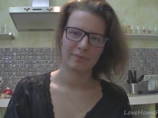 Solo damsel with glasses chatting in the kitchen